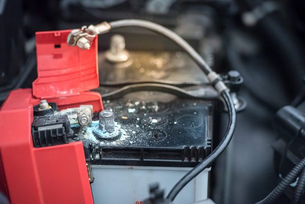 Can a corroded battery wire cause check engine light