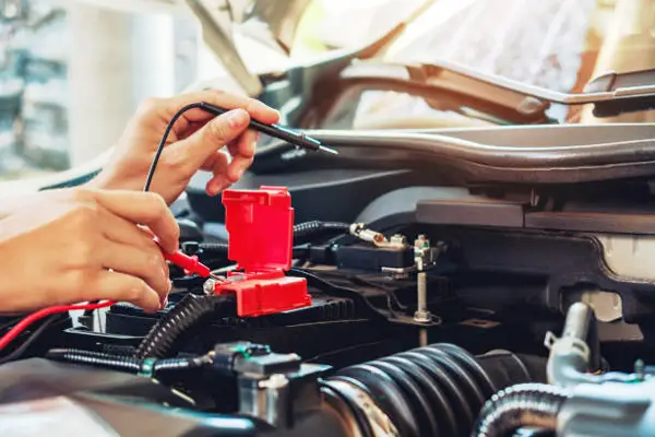What causes check engine light after a dead battery