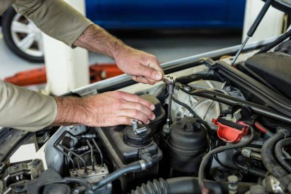 Why your check engine light is one and car is sputtering