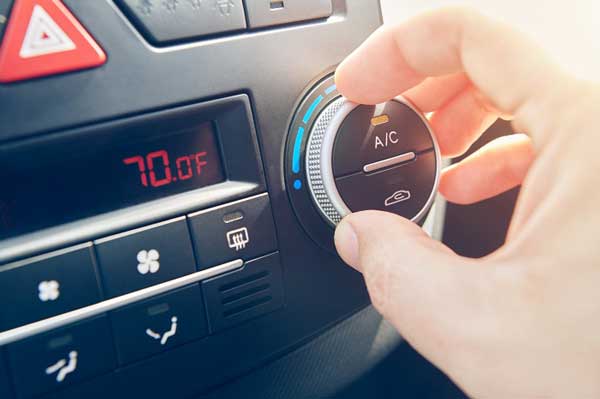 What does it mean if the brake pedal vibrates when AC is on