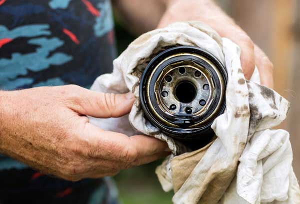 Can a clogged oil filter cause overheating