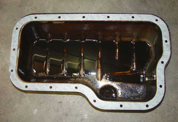 Damaged oil pan gasket