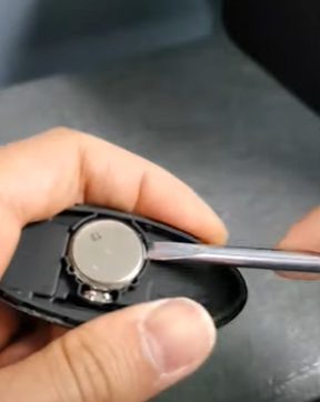 Place the new battery
