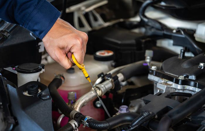 Checking the Oil Level With the Dipstick