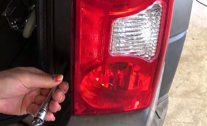 Identify the broken brake light